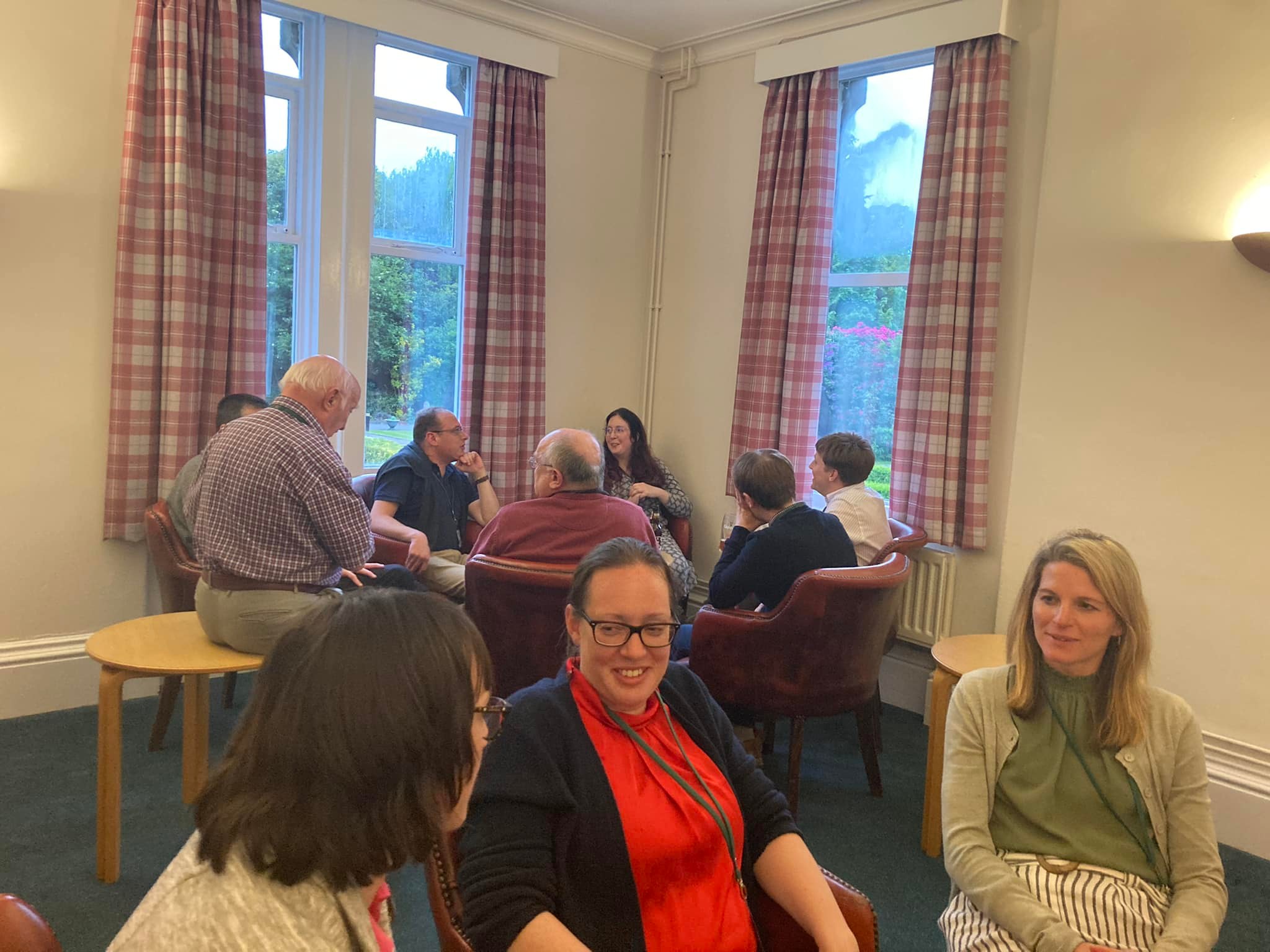 May be an image of 9 people, people sitting and indoor